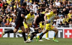 Tawera Kerr-Barlow (R) won the 2015 Rugby World Cup