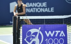 The WTA logo on the net during in August 2021's Montreal Open