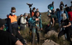 Spanish athlete Beatriz Flamini emerges from a cave after spending 500 days inside 