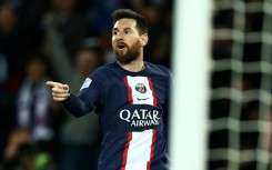 Lionel Messi celebrates after scoring in Paris Saint-Germain's win over title rivals Lens on Saturday