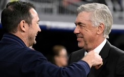 Real Madrid coach Carlo Ancelotti (R) greets Chelsea's Frank Lampard ahead of the first leg clash at the Santiago Bernabeu