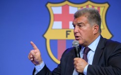 Making a point: club president Joan Laporta told  a press conference that 'Barcelona has not committed any crime'  amid investigations into payments made to a former refereeing chief