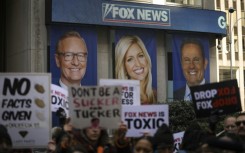 Protestors outside Fox News, which is being sued for $1.6 billion by Dominion Voting Systems