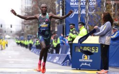 Evans Chebet of Kenya celebrates after successfully defending his Boston Marathon title