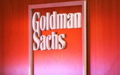 Goldman Sachs reported lower profits on a slowdown in merger advising and weak trading results 