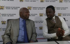 Athetic Kenya President Jackson Tuwei (L) alongside Sports Minister Ababu Namwamba (R) at the anti-doping report presentation in Nairobi