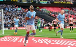 Manchester City's Riyad Mahrez celebrates scoring against Sheffield United