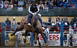 An inmate competes in Bareback Horse Riding during the Angola Prison Rodeo