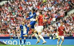 Atletico Madrid's Spanish forward Alvaro Morata (C) heads the ball home for his side's second against Mallorca