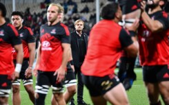 Crusaders' coach Scott Robertson (C) is relishing Saturday's Super Rugby clash at the unbeaten Chiefs in Hamilton