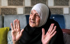 Refugee Amina al-Dabai says she would not accept compensation and no longer expects to return, but 'future generations will liberate the country'