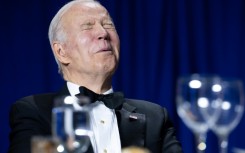 US President Joe Biden takes a joke during the White House Correspondents' Association dinner