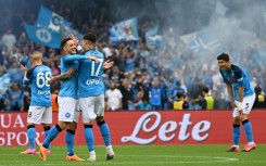 Great start: Napoli's Giacomo Raspadori congratulates goalscorer Mathias Olivera