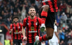 At the double - Bournemouth's midfielder Jefferson Lerma (R) celebrates after the first of his two goals in a 3-1 win over Leeds