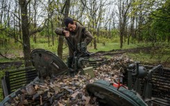 Ukrainian soldiers carry out regular maintenance on their equipment