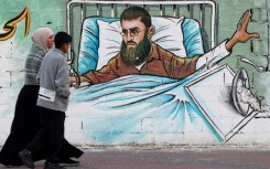 A mural in Gaza City depicts Khader Adnan, who died Tuesday May 2, 2023 in Israeli custody after nearly three months on hunger strike