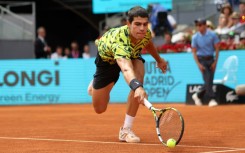 Spain's Carlos Alcaraz returns the ball to Germany's Alexander Zverev during his victory at the Madrid Open