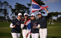 Thailand golfers, from left, Ariya Jutanugarn, Patty Tavatanakit, Moriya Jutanugarn and Atthaya Thitikul celebrate their victory over Australia in the final to capture the LPGA International Crown at Harding Park