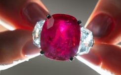 A Cartier ruby and diamond ring is expected to fetch at least $14 million at the auction in Geneva