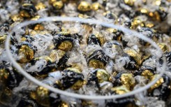 Many chocolate makers are not improving pay for farmers in Ghana, according to the charity Oxfam