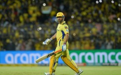 Cometh the hour: Mahendra Singh Dhoni comes in to bat on Wednesday