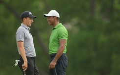 Tiger Woods, right, will miss next week's PGA Championship after ankle surgery while Jordan Spieth, left, is questionable with a wrist injury for the major showdown at Oak Hill