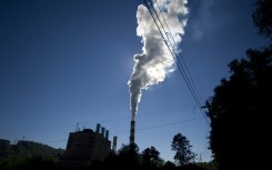 A plume of exhaust extends from the Mitchell Power Station, a coal-fired power plant located 20 miles southwest of Pittsburgh, in 2013