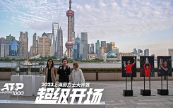 People pose for a picture next to an ATP sign before the Shanghai Masters launch ceremony in Shanghai this week