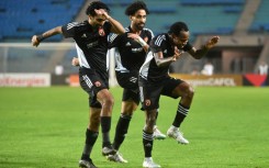 South African Percy Tau (R) celebrates his second goal for Al Ahly against Esperance in Tunisia.