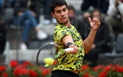 Top of the world: Carlos Alcaraz plays a return to Albert Ramos-Vinolas on Saturday 