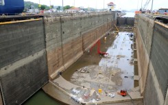 While work goes on in this chamber of the Panama Canal's Pedro Miguel locks, ships can still pass through the other chamber 