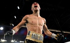 Jason Moloney of Australia won his first world title with a majority decision over Filipino rival Vincent Astrolabio to capture the WBO bantamweight crown