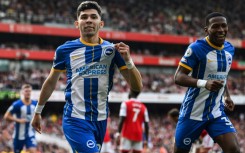 On target: Brighton's Julio Enciso celebrates after scoring at Arsenal
