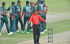 Umpire Allahudien Paleker signalling for a video review as South Africa batted gainst Bangladesh  in an ODI in 2022