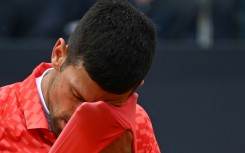 Novak Djokovic needed treatment in the second set before losing his Italian Open quarter-final to Holger Rune