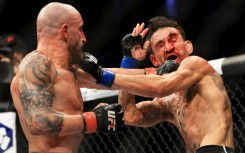 Australian featherweight champion Alexander Volkanovski (L) is hoping to fight in Sydney with the city to host three UFC events