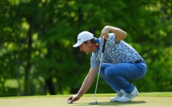 England's Justin Rose, chasing his first major title in a decade, grabbed a share of the early lead in the second round of the PGA Championship at Oak Hill