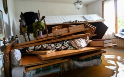 The floods have caused over 305 landslides and damaged or closed over 500 roads.