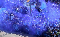 Fans waiting for Manchester City's team bus
