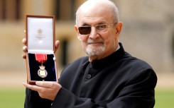 Salman Rushdie was invested as a Companion of Honour at Windsor Castle west of London