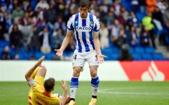 Real Sociedad's French defender Robin Le Normand (R) can now play for the Spanish national team