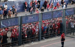Liverpool fans outside the Stade de France at last year's Champions League final between their team and Real Madrid