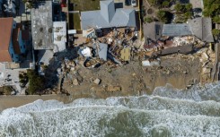 An aerial view of destroyed beachfront homes in the aftermath of Hurricane Nicole at Daytona Beach, Florida, on November 11, 2022