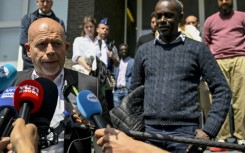 A Belgian court sentenced 18 members of a college fraternity to community service over the death of student Sanda Dia in 2018