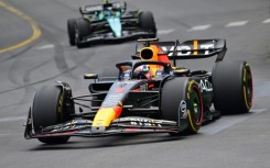 Waiting game: Fernando Alonso said he is prepared to follow Max Verstappen's Red Bull and watch for a  chance 