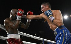 Australian boxer Tim Tszyu (R) has had surgery, reportedly for a dog bite