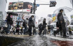 Scientists say climate change is intensifying the risk of heavy rain in Japan
