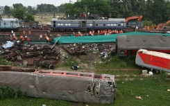 Trains resume service near Balasore in India's eastern Odisha state after a crash that killed almost 300 people on Friday