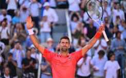 Novak Djokovic celebrates his victory over Karen Khachanov