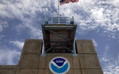 The logo of National Oceanic and Atmospheric Administration (NOAA) is seen at the Nation Hurricane Center on August in Miami